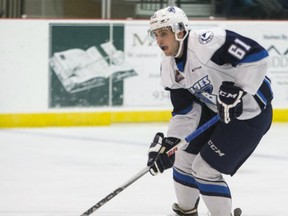 Sixteen-year-old rookie Josh Paterson moves the puck as the Saskatoon Blades take on the Prince Albert Raiders in pre-season WHL action