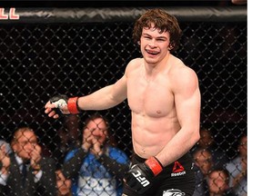 Olivier Aubin-Mercier of Canada reacts after his submission victory at UFC 186.
