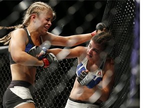 Paige VanZant defeated Alex Chambers in their women’s strawweight bout at UFC 191 on Saturday, Sept. 5, 2015, in Las Vegas. (AP Photo/John Locher)
