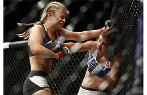 Paige VanZant defeated Alex Chambers in their women’s strawweight bout at UFC 191 on Saturday, Sept. 5, 2015, in Las Vegas. (AP Photo/John Locher)