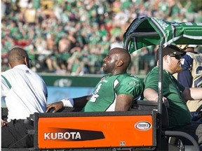 Saskatchewan Roughriders quarterback Darian Durant leaves the field after being injured against the Winnipeg Blue Bombers during the second quarter of CFL football action in Regina, Sask., Saturday, June 27, 2015. THE CANADIAN PRESS/Rick Elvin