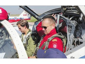StarPhoenix reporter HenryTye Glazebrook prepares to fly with the Snowbirds on Friday in Saskatoon with Capt. Shamus Allen at the controls.