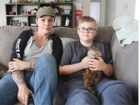 Stephanie Bachman, can be seen with her son Joshua, 9, in their home in Saskatoon's Forest Grove neighbourhood on Wednesday afternoon. She said while she wasn't surprised to hear about a recent string of break-ins in the 400 Block of 115th Street East, it is concerning, but said its proof that no neighbourhood is immune to crime.(Morgan Modjeski/the StarPhoenix)