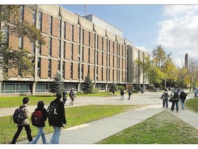 Students, like these at the University of Windsor, need to learn skills to avoid debt burdens after graduation.