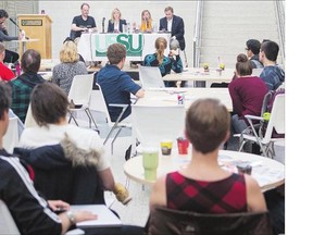 Students listen during a candidates debate forum put on by the University of Saskatchewan's students union at the Health and Sciences Building on campus Wednesday. Among concerns expressed was the difficulty of students voting when their home address is listed as their hometown.