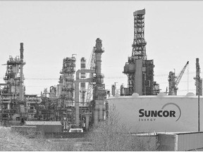 Suncor executives mused Thursday about new acquisitions and buying back stock, following quarterly results that smashed analysts' expectations.