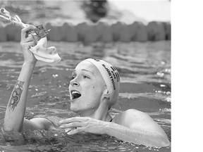 Sweden's gold medal winner Sarah Sjostrom celebrates after setting a new world record in the women's 100m butterfly final in Kazan, Russia, Monday.