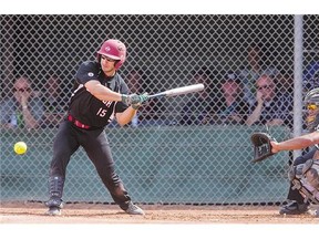 Team Canada outfielder Mathieu Roy lets a pitch from Team New Zealand go by him during the World Softball tournament at Bob Van Impe field on Sunday.