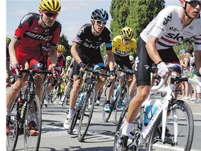 Tejay van Garderen, left, is chasing Chris Froome, second left wearing the overall leader's yellow jersey, for the lead as the Tour de France heads to the big climbs.