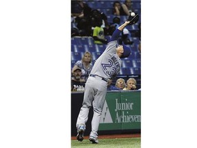 Third baseman Danny Valencia of the Toronto Blue Jays catches a foul ball off the bat of David DeJesus of the Tampa Bay Rays in Florida Monday night.