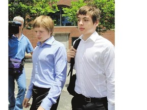 Timothy, left, and Alexander Vavilov, shown in 2010 after a bail hearing in Boston for parents Andrey Bezrukov and Elena Vavilova, are trying to retain Canadian citizenship.