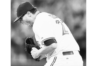 Toronto Blue Jays relief pitcher Brett Cecil reacts after striking out the side in the eighth inning of Monday's game against the New York Yankees at Rogers Centre. The Jays were 4-2 winners.