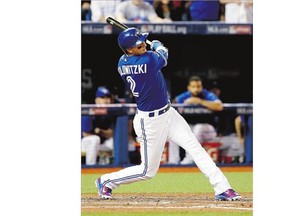 Toronto Blue Jays' Troy Tulowitzki rips a bases-loaded double to score three runs in Game 5 action of the ALCS in Toronto Wednesday. The Jays were 7-1 winners, but trail the series 3-2 heading back to Kansas City.