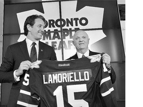 Toronto Maple Leafs president Brendan Shanahan, left, announces the hiring of Lou Lamoriello as general manager of the Maple Leafs on Thursday.