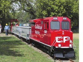The new train for Kinsmen Park moves along the rails for the first time Thursday.