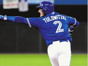 Troy Tulowitzki of the Toronto Blue Jays celebrates his three-run home run in Game 3 of the ALCS against the Kansas City Royals at Rogers Centre on Monday. After a slow start, Tulo has evolved into a key run-producer for the Jays heading into Friday's Game 6.