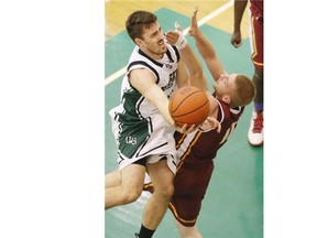 University of Saskatchewan Huskies’ Evan Ostertag goes up against Concordia Stingers’ Jean-Daniel Mathieu at the PAC on U of S campus, October 15, 2015, during the 17th annual Graham Shootout.