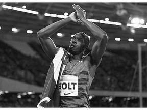 Usain Bolt of Jamaica celebrates winning the men's 100m final in a time of 9.87 seconds at the Diamond League meet in London on Friday.