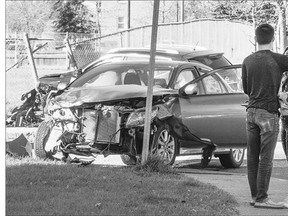 A two-vehicle crash at Bottomley Avenue and Temperance Street on Friday heavily damaged both vehicles.