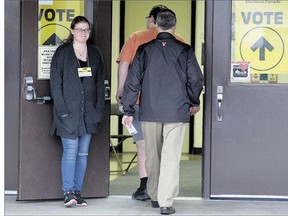 Voters enter the polling station at Bishop Pocock School to vote on Monday.