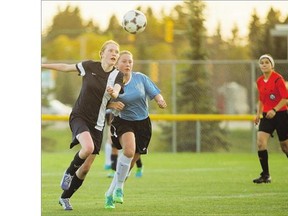 Walter Murray takes on Aden Bowman in high school girls soccer at TCU Field at SaskTel Sports Centre on Tuesday.