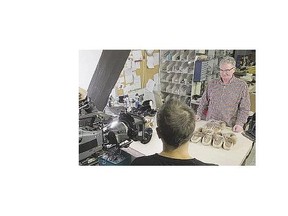 Wayne Holoboff, president of The Great Plains Moccasin Factory Inc., (in a checkered shirt) being filmed for a How it's Made program