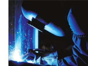 Welder Andrew Riche works on a project in this 2011 photo. Welders and machine operators had the fifth highest number of workplace injury claims in 2014, following labourers in processing, manufacturing and utilities, who were fourth.