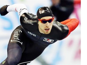 File Photo. William Dutton of Canada skates in the men’s 1,000 metres race at the World Sprint Speed Skating Championships in Nagano, Japan, on Jan. 18, 2014. (AP Photo/Koji Sasahara)