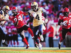 Winnipeg Blue Bombers receiver Darvin Adams, centre, was a favourite target of NFL quarterback Cam Newton when they played in the NCAA for the Auburn Tigers.