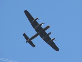 A Second World War era Lancaster bomber flies over downtown Welland on Oct. 10. Greg Furminger/Welland Tribune/Postmedia Network