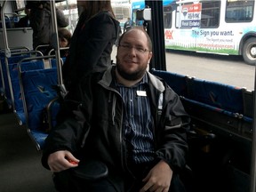 Andy Livingston, of the Human Rights Commission, praises the new accessibility features on Saskatoon Transit buses. Richard Marjan photo
