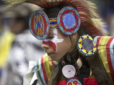 A dancer takes part in the opening ceremonies  during the Federation of Saskatchewan Indian Nations (FSIN) Cultural Celebration and Pow Wow at SaskTel Centre in Saskatoon, November 15, 2015.