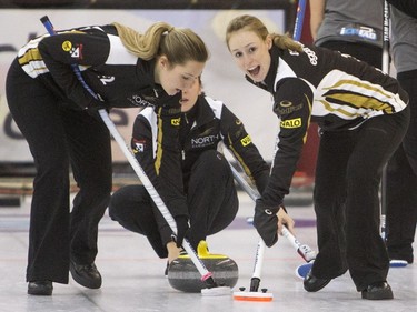 Team Jaggi second Stéphanie Jäggi (R) and lead Vera Camponovo sweep against Team McCarville during the B-event finals of the Colonial Square Ladies Curling Classic at the Nutana Curling Club, November 8, 2015.