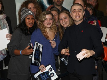 Daniel Radcliffe greets fans at a special screening of "Victor Frankenstein" at the Bow Tie Chelsea Cinemas in New York, November 10, 2015.