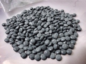 Fentanyl pills are shown in an undated police handout photo. National RCMP are working with the United Nations and China to dampen the influx of dangerous opioid fentanyl onto Canada's streets, but one high-level investigator is expecting the insidious problem could worsen.