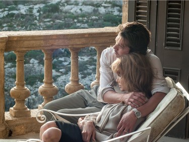 Brad Pitt as Roland comforting Angelina Jolie Pitt as Vanessa in "By the Sea," directed by Jolie Pitt.