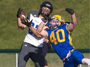 Saskatoon Hilltops linebacker Adam Benkic knocks away a pass intended for Winnipeg Rifles slotback Xander Tachinski in PFC semifinal playoff action at SMF Field. (Liam Richards/the StarPhoenix)