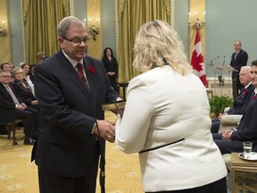 Prime Minister Justin Trudeau looks on as Lawrence MacAulay is sworn in as Minister of Minister fo Agriculture and Agri-Food during a ceremony at Rideau Hall in Ottawa on Wednesday, November 4, 2015.