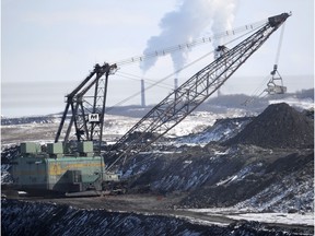 A dragline works in Alberta's Highvale Coal Mine in 2014 to supply the nearby Sundance power plant.