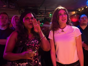 Mindy Kaling as Sarah (L) and Lizzy Caplan as Diana in Columbia Pictures' "The Night Before."