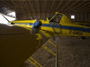 NORTH BATTLEFORD, SASK--SEPTEMBER 17-Fran de Kock, owner of Battlefords Airspray and lead instructor at the organizations' agricultural pilot training school, poses for a photograph in the Battlefords Airspray hangar on Thursday, September 17th, 2015.