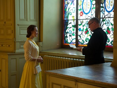 Saoirse Ronan as Eilis Lacey and Jim Broadbent as Father Flood in "Brooklyn."