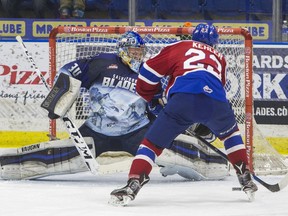 Saskatoon Blades goaltender Brock Hamm makes a save on Edmonton Oil Kings forward Colton Kehler in first period WHL action on Saturday.