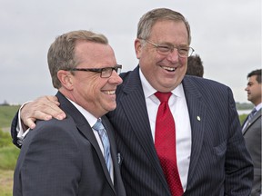 Premier Brad Wall and Mayor Don Atchison at the June announcement for funding the north commuter bridge in Saskatoon.