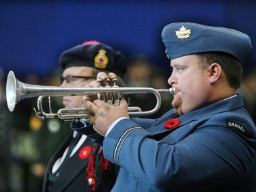 The largest indoor Remembrance Day service in Canada was held at SaskTel Centre in Saskatoon, November 11, 2015. Piper Brad Fenty with the Saskatoon Legion and bugler Lt. Aaron Vopni were on hand for the event.
