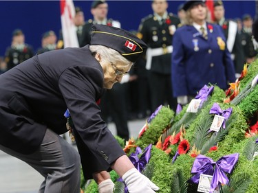 The largest indoor Remembrance Day service in Canada was held at SaskTel Centre in Saskatoon, November 11, 2015. Sports officer Terry Stewart with the Saskatchewan Provincial Command lays wreaths at the foot of the cenotaph.