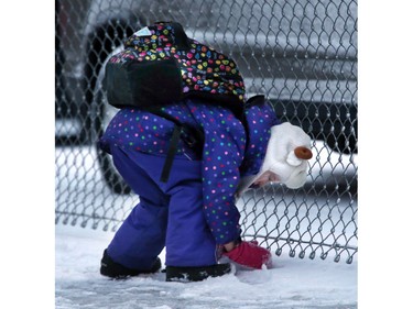 Students at Victoria School in the first snowfall in Saskatoon, November 18, 2015.