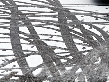 Tracks in the snow tell a tale of people walking after parking on November 18, 2015 in Saskatoon.