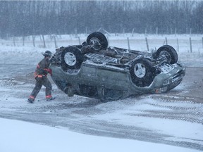Emergency personnel respond to a rollover approximately 13 km. east of Saskatoon on Highway 16 on Nov. 24, 2015 in Saskatoon.