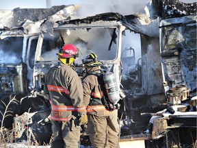 Emergency personnel from Saskatoon and Warman responded to a fire at Saskatoon Truck Salvage in the Corman Park Industrial park on November 30, 2015 in Saskatoon. Three semi tractor units were burned in the fire.